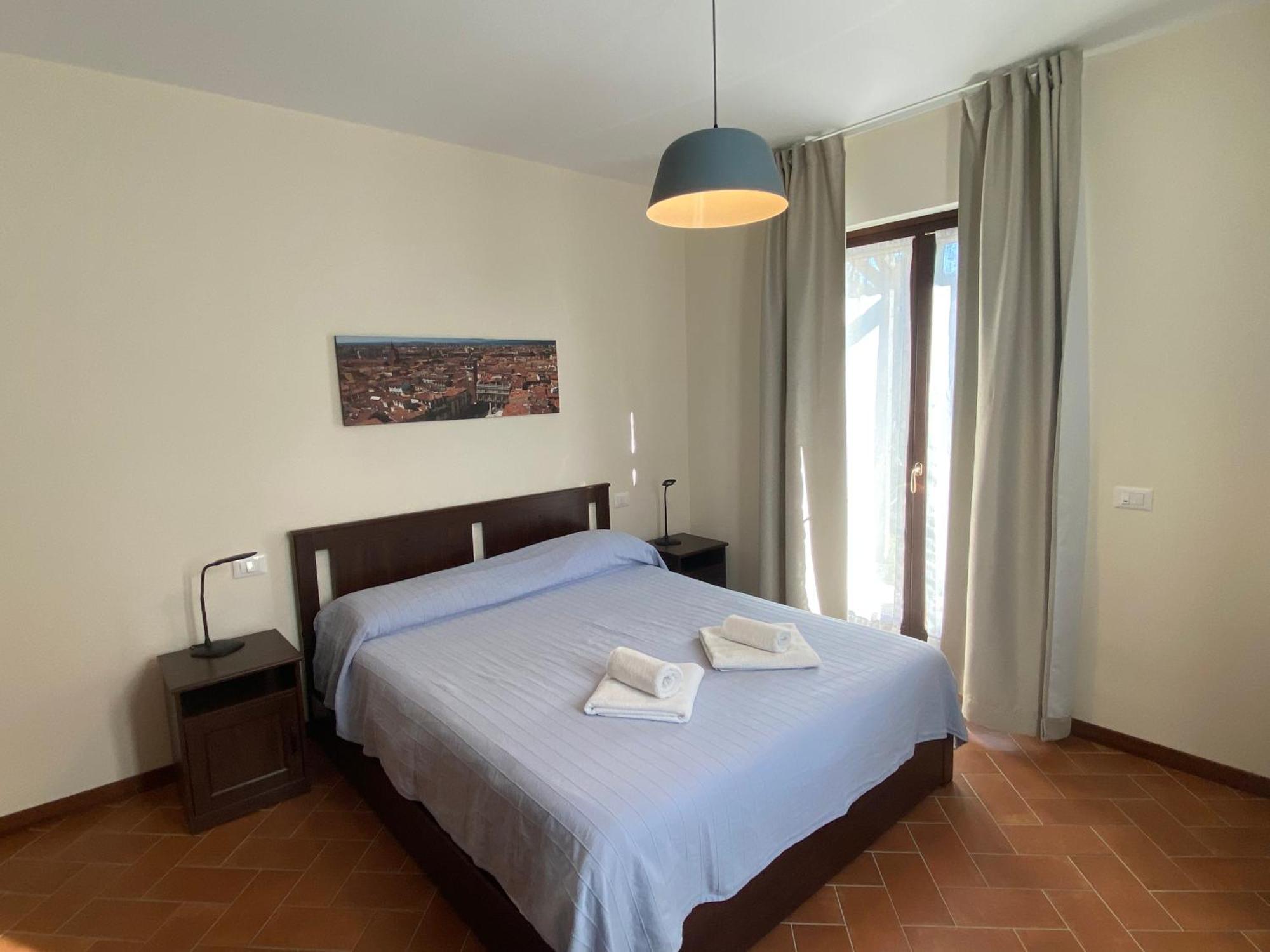 Residenza Cipressi E Olivi Apartment Verona Bagian luar foto